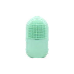 Facial Massager - Mint green silicone facial ice roller with a textured dotted upper surface