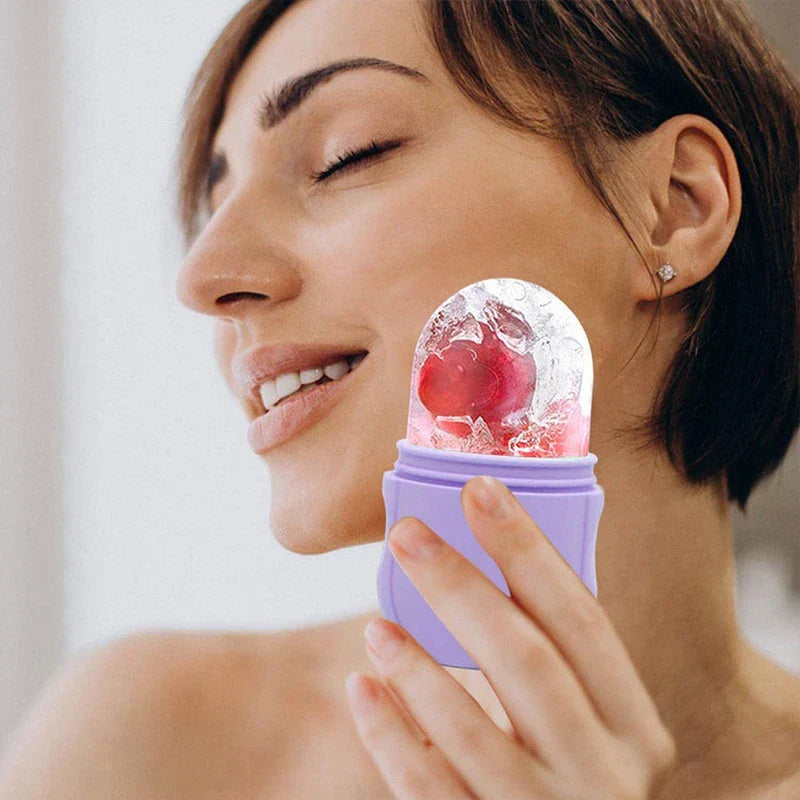 A person holds a purple container with a frozen ice mass near their face