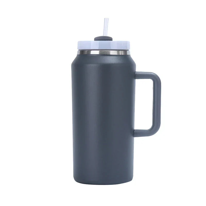 Car Travel Mug - Matte dark gray handled tumbler with white screw lid, attached white straw, stainless steel neck band, against plain white background