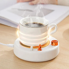 Insulated Mug - White USB powered mug warmer with a white coffee cup of steaming coffee resting on its heated surface