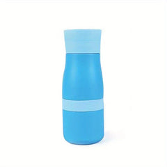 Stainless Steel Tumbler Cup - Blue insulated water bottle with lighter blue cap and midsection band, standing on white background