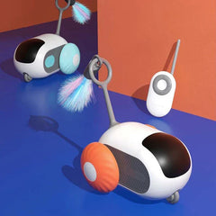 Electronic Cat Chase Toy Car - Two toy units (one orange-wheeled, one light blue-wheeled) with remote placed against a two-tone wall