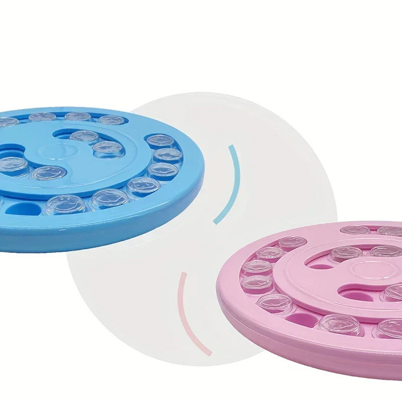 Pet Puzzle Feeder - Round blue and pink interactive pet toy discs with clear covered slots, separated by curved arrows showing rotation