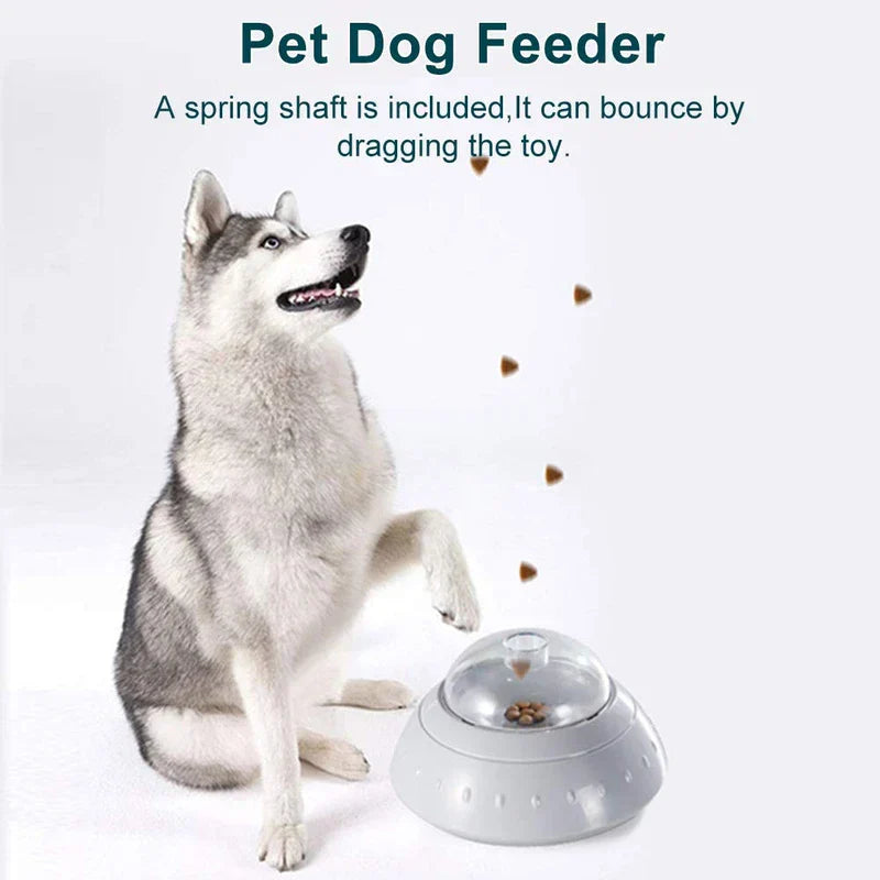 Pet Bowl - Gray UFO-shaped pet feeder toy dispensing kibble as a husky interacts with it