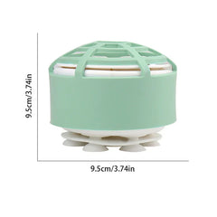 Mini Dishwasher - Mint green round domed gadget with suction cup base, shown with 9.5cm height and width dimension markings