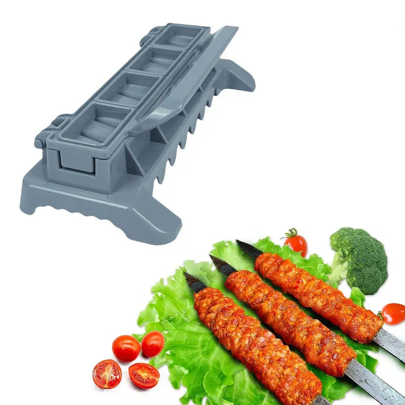 Kebab Skewer Maker Meat Stringer Box - Gray kebab prep tool displayed alongside three finished seasoned meat skewers on lettuce with cherry tomatoes and broccoli