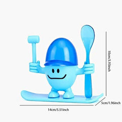 Egg Cup Holder - Light blue cartoon egg cup figure on a board, holding a small mallet and spoon, with measurement dimensions