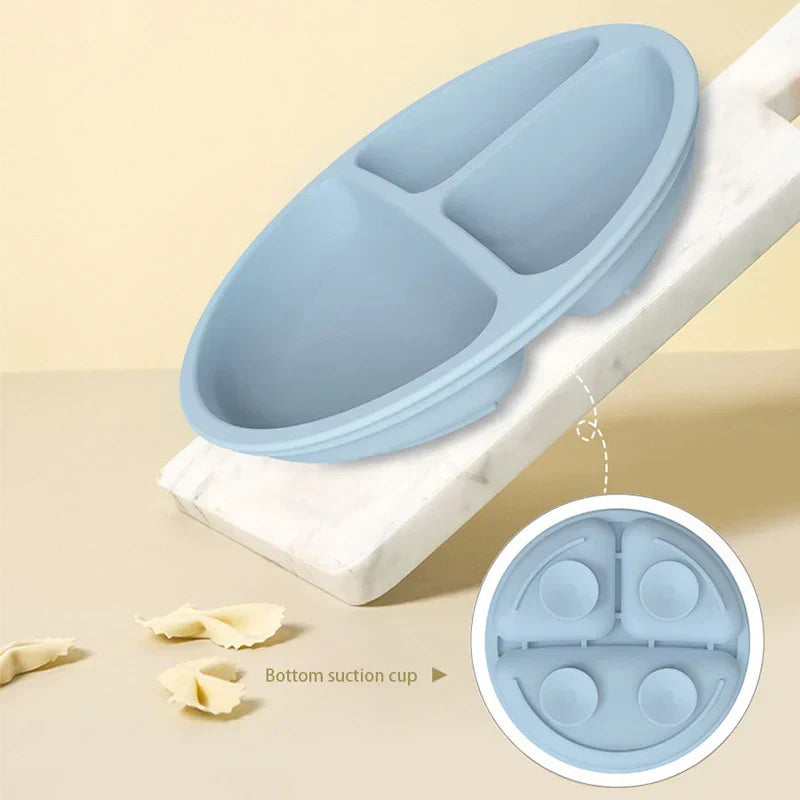 Cutlery Set - Light blue divided plate placed on a sloped marble block, inset showing four suction cups on the plate's bottom