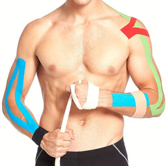 Kinesiology Tape Roll - Shirtless man with kinesiology tape on his shoulder and arms, wrapping a bandage around his left wrist.