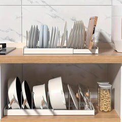 Kitchen Storage Rack - Two units holding plates on countertop and cookware inside lower cabinet