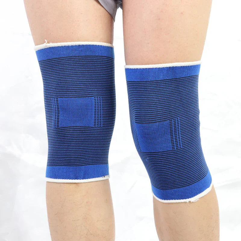 Protector - Pair of matching blue knit knee sleeves worn on both knees of a person, seen from the front