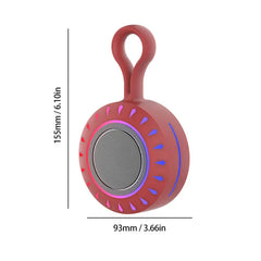 Portable Bluetooth Speaker - Red portable speaker with integrated top loop, circular front, gradient pink-to-purple ring, red-to-blue accent marks, dimension lines showing size