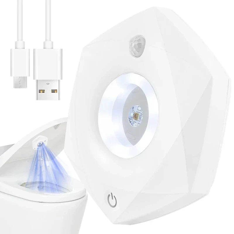 Led Tap Puck Light - Light unit shown with included USB charging cables, mounted on a toilet seat emitting blue light