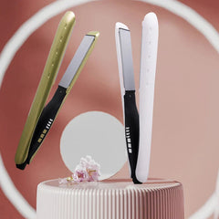 Hair Straightener Flat Iron - Two styling tools (one gold, one white) displayed upright on a ribbed pedestal with pink flower accents against a warm rose background