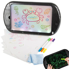 Led Magic Drawing Board - Drawing board displaying colorful undersea themed drawings, with tracing stencil sheets, markers, cleaning cloth, and smaller drawing pad shown alongside