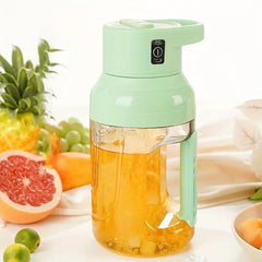 Centrifugal Juicer Machine - Mint green juicer filled with golden juice, displayed with assorted fresh produce in background