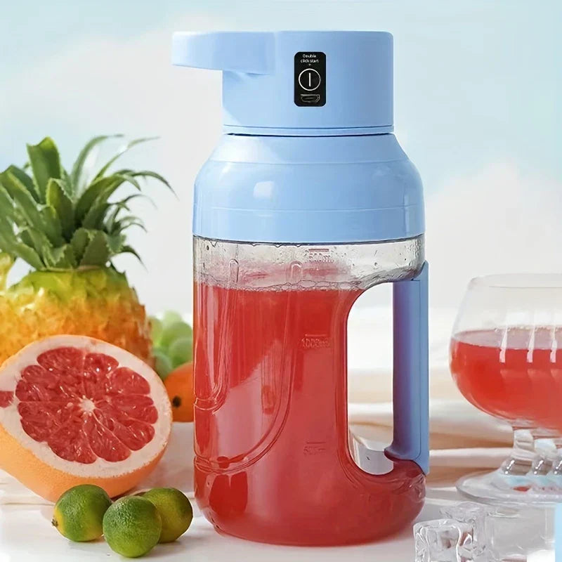 Centrifugal Juicer Machine - Light blue portable blender filled with red juice, surrounded by fresh fruit, a glass of juice and ice cubes.