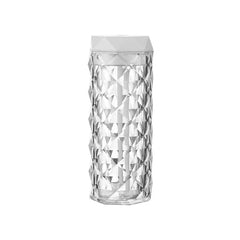 Cool Mist Humidifier - Tall faceted transparent humidifier with geometric white top cap, studio product shot against plain white background