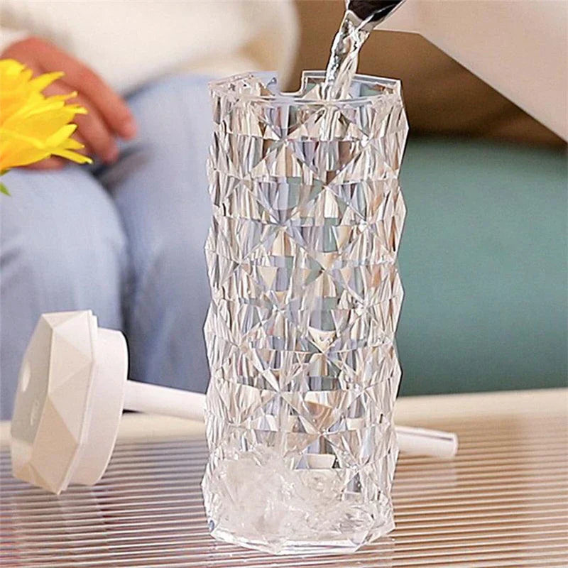 Cool Mist Humidifier - Faceted transparent humidifier with cap removed, having water poured into its open tank