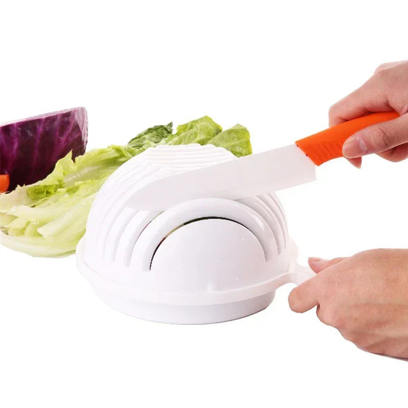 Serving Bowl Set - Hands holding a white slotted hemispherical kitchen tool and a knife, with loose vegetables behind it