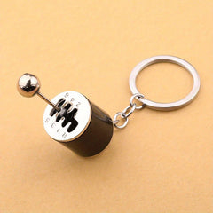 Close-up of a leather keychain holder with stitching