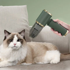 Stick Vacuum - Olive green unit with transparent dust canister being used near a cat resting on a sofa