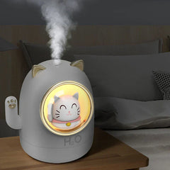 Mini humidifier diffuser near a nightstand