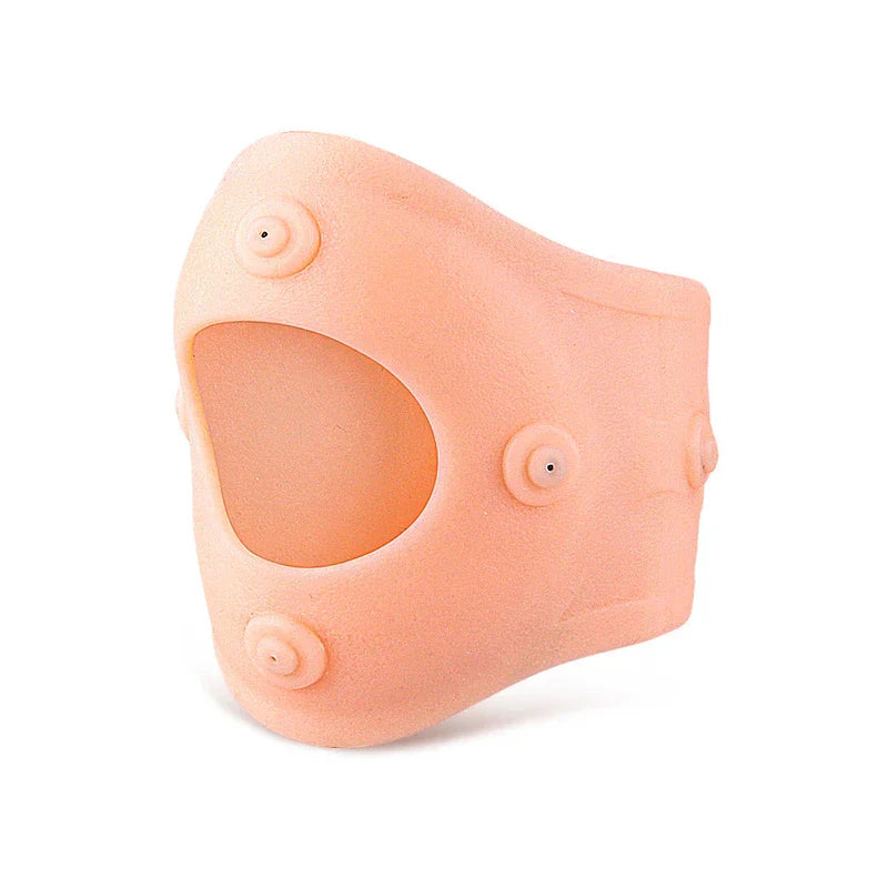 Peach-colored flexible knee sleeve with circular raised nodes and a patella cutout, shown against a plain white background.