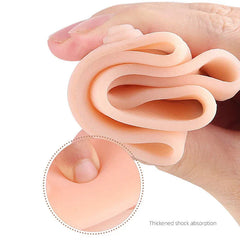 Hand holds a folded flexible beige silicone pad, with a close-up inset of a finger pressing into the pad.