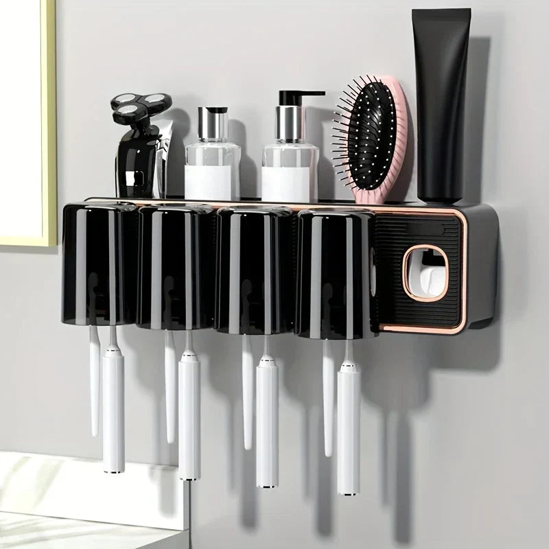 Magnetic Toothbrush Holder Set - Wall-mounted toothbrush holder with black glossy inverted cups, holding electric toothbrushes, with toiletries on its top shelf against a light wall.