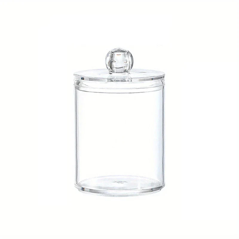 Makeup brush holder with cotton swab dispenser on a vanity