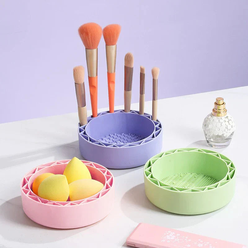 makeup brush cleaning scrubber bowl mat in use with a brush being swirled