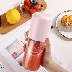 Glass citrus juicer cup showing the reamer and collection cup design