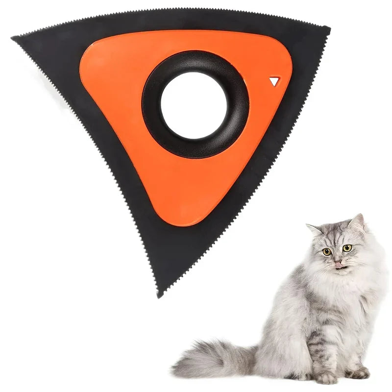 Brush - Triangular orange and black fabric care tool shown next to a long-haired gray cat