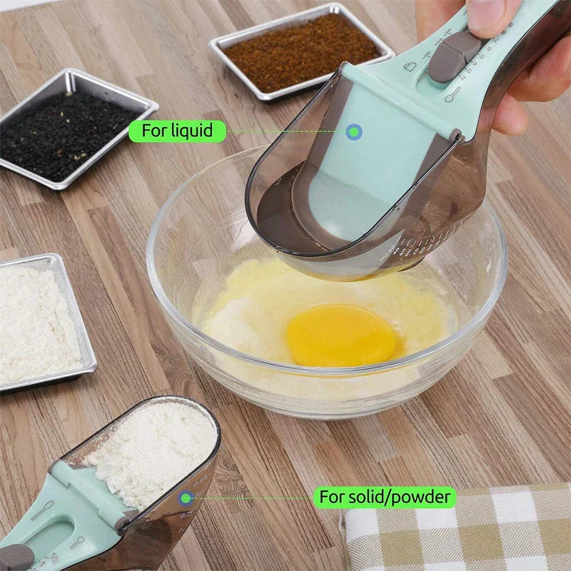 Kitchen Tool - A hand holds a large adjustable measuring scoop over a glass bowl with egg; a smaller flour-filled scoop sits on the table, with labeled use indicators.