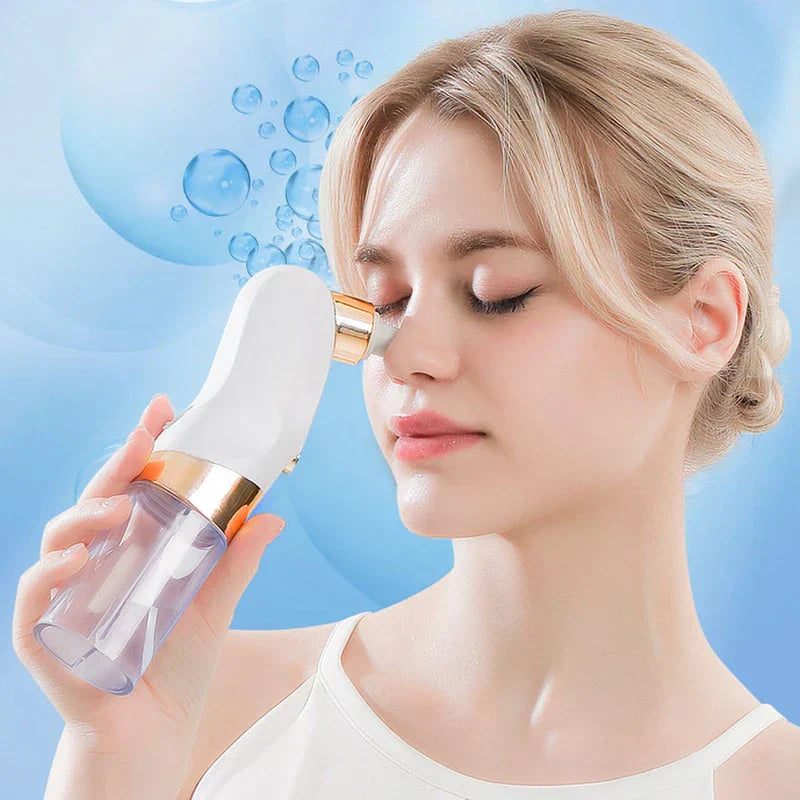 Beauty Device - Person holding the cleansing tool to use on the nose area, with light blue bubble graphic background