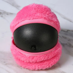 Microfiber Robotic Mop Ball Cleaner - Partially unzipped bright pink plush round case revealing black plastic inner ball, on marble surface.