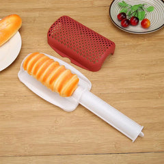 Microwave Hot Dog Cooker - Red and white plastic microwave hot dog maker with cooked hot dog on tray, staged with bread and cherries on a wood surface