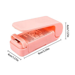 Heat Sealer - Light pink handheld mini bag sealer shown open with dimensions labeled on a white background