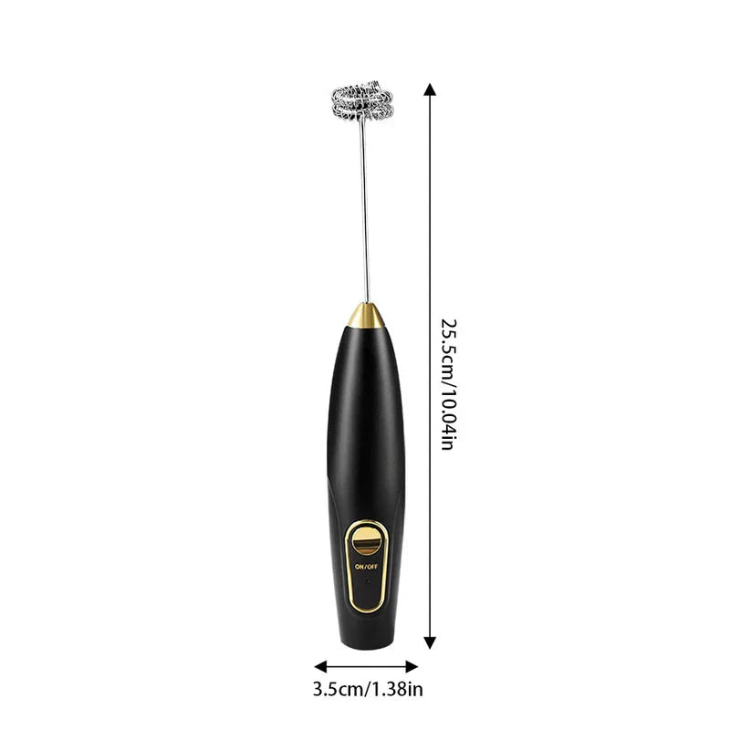 Black handheld electric milk frother with gold accents, displayed with length and width measurements