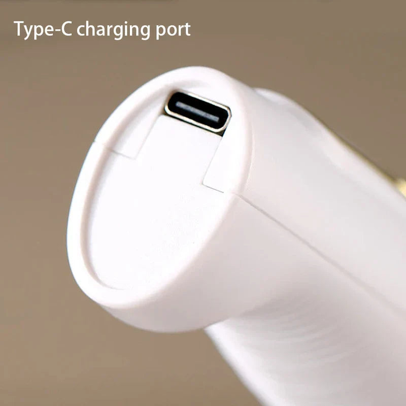 Electric Milk Frother - Close-up of a white device’s end showing an exposed Type-C charging port, with text reading 'Type-C charging port' at upper left.