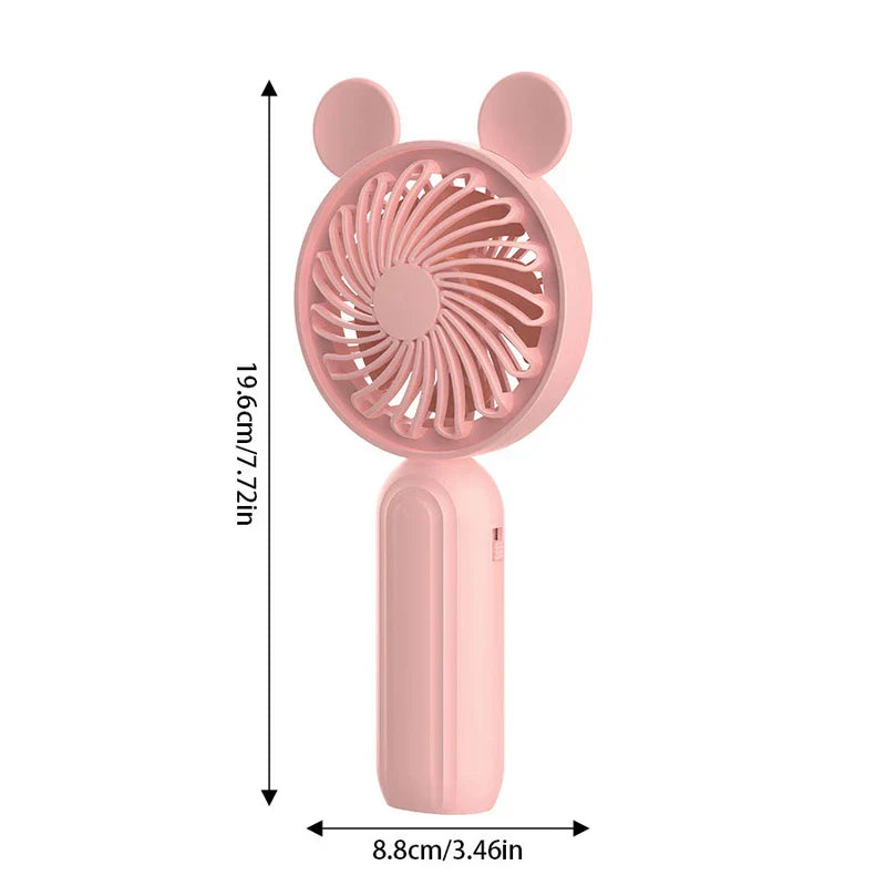 Mini Manual Handheld Squeeze Fan - Light pink handheld mini fan with Mickey-style ear accents, showing dimension markings of 19.6cm tall and 8.8cm wide, against a white background