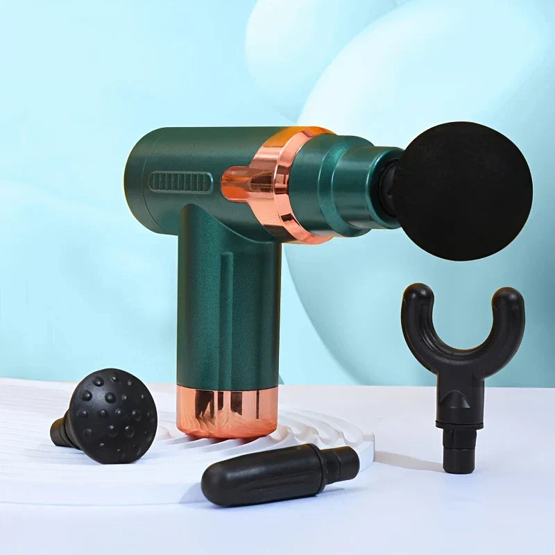 Percussion Massage Gun - Compact massage device displayed with four interchangeable black massage heads on a light blue and white surface