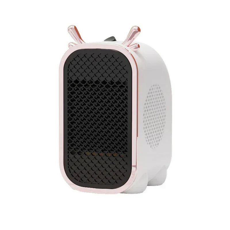 Mini Space Heater - Front view of white compact personal heater with rose gold accent details and decorative top elements