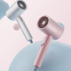 Portable hair dryer in use