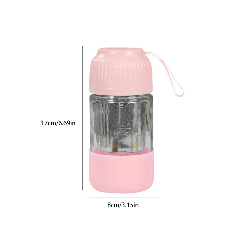 Mini Juicer Blender - Pink lidded glass water bottle with attached carry strap, internal mesh infuser, pink base sleeve, shown with 17cm height and 8cm width dimensions.