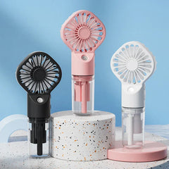 Usb Fan - Three portable handheld fans in black, pink, and white displayed on stands against a blue background