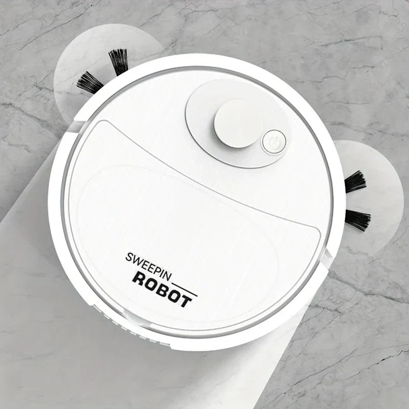 Robot Vacuum & Mop - Top-down angled view of white round compact cleaning device with extended side brushes resting on a light marble-patterned floor