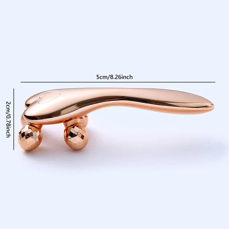 Face Slimming Massager - Side profile view of a rose gold facial roller showing its dimensions: 5cm long, 2cm tall