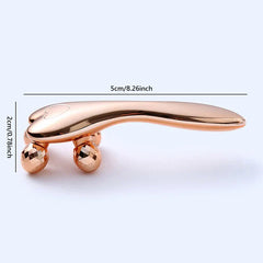 Face Slimming Massager - Side profile view of a rose gold facial roller showing its dimensions: 5cm long, 2cm tall